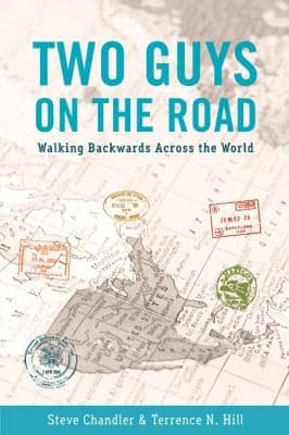Cover of Two Guys On The Road Walking Backwards Across The World